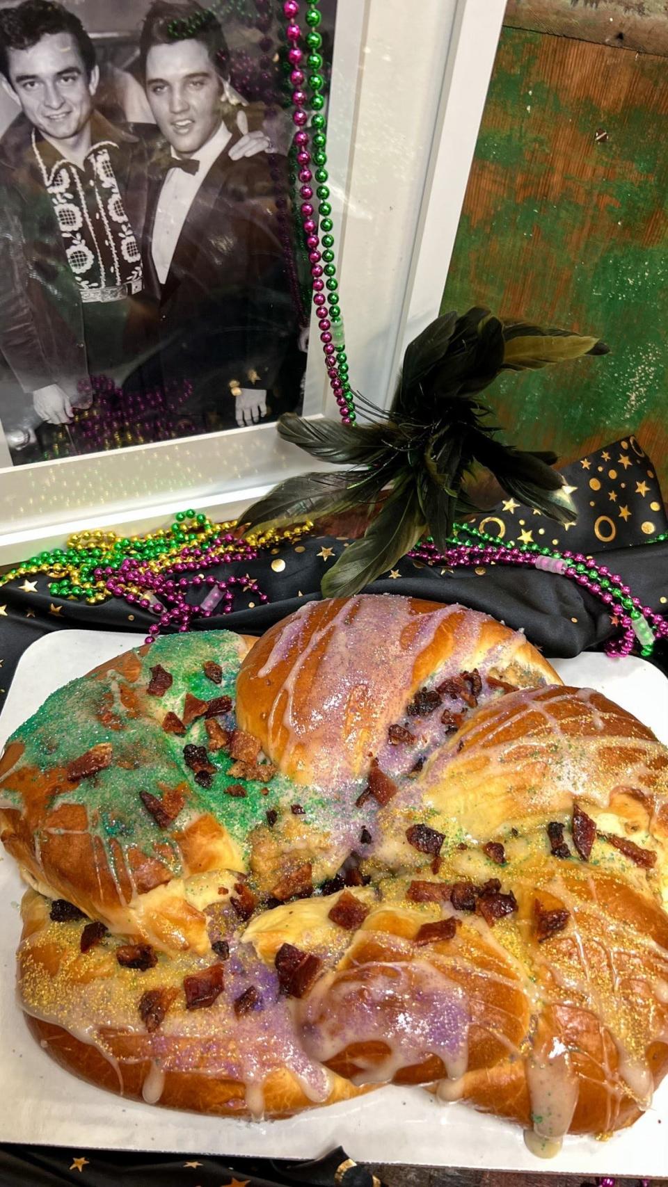 The “King Creole” King Cake ($45 each) at Farm and Fig.  This over-the-top King Cake is filled with banana and peanut butter pastry cream and topped with marshmallow glaze and candied bacon.