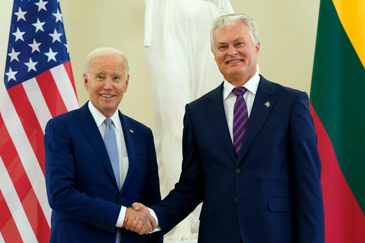 Lithuania's President Gitanas Nauseda, left, shake hands with U.S. President Joe Biden (AP)