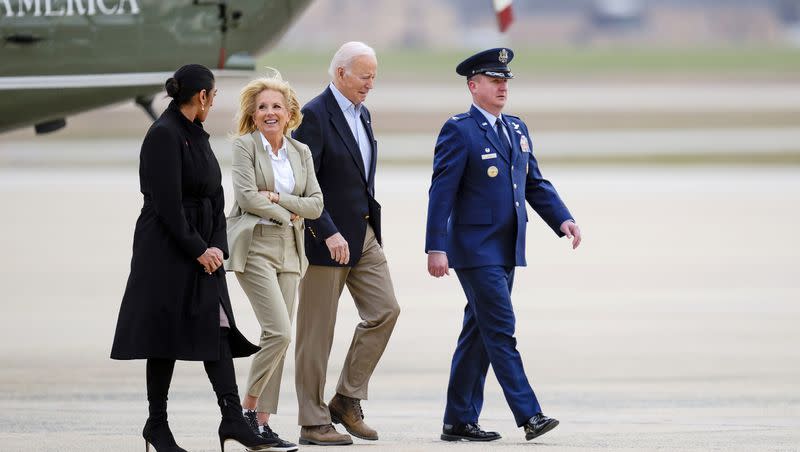 President Joe Biden and first lady Jill Biden are escorted by Sarb Edmund, 89th Airlift Wing Senior Training Protocol Specialist, and Colonel Matthew Jones, Commander, 89th Airlift Wing, as they walk from Marine One to board Air Force One at Andrews Air Force Base, Md., Friday, March 31, 2023, en route to Rolling Fork, Miss., to meet with those impacted by last week’s massive storm.