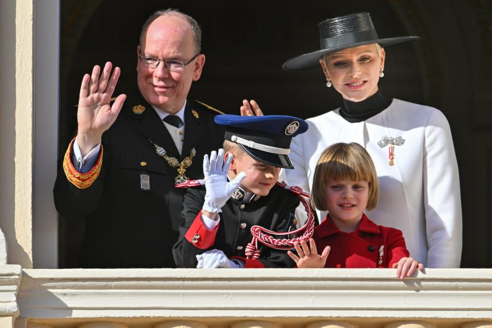 MONTE-CARLO, MONACO - NOVEMBER 19: (EDITORS NOTE : NO TABLOIDS). Princess Charlene of Monaco, Prince Albert II of Monaco with his children Prince Jacques of Monaco and Princess Gabriella of Monaco appear at the Palace balcony during the Monaco National Day on November 19, 2022 in Monte-Carlo, Monaco. (Photo by Stephane Cardinale - Corbis/Corbis via Getty Images)