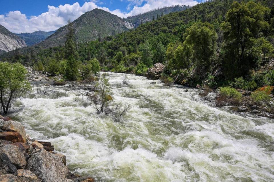 The Merced River rages with white water down the river canyon outside of Yosemite National Park near El Portal as the snowmelt continues following an historic year for snow, on Tuesday, June 13, 2023.