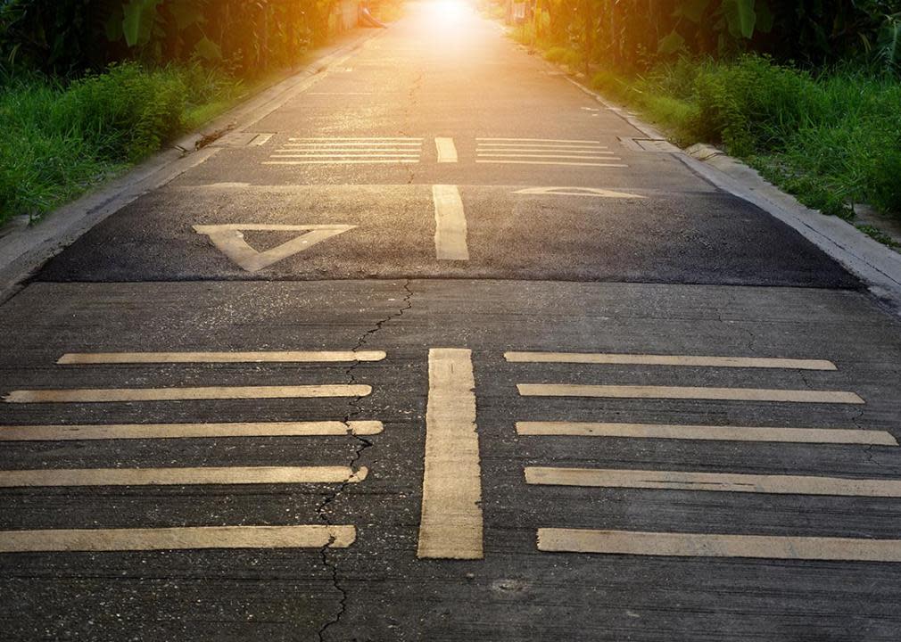 low angle view of road with speed hump and lines painted