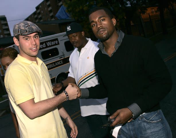 <p>Ben Rose/WireImage</p> Scooter Braun and Kanye West