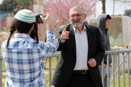 Michael Ben-Ari from the Jewish Power party visits the scene of the shooting attack near the Jewish settlement of Ariel, in the Israeli-occupied West Bank March 17, 2019. Picture taken March 17, 2019. REUTERS/Ammar Awad