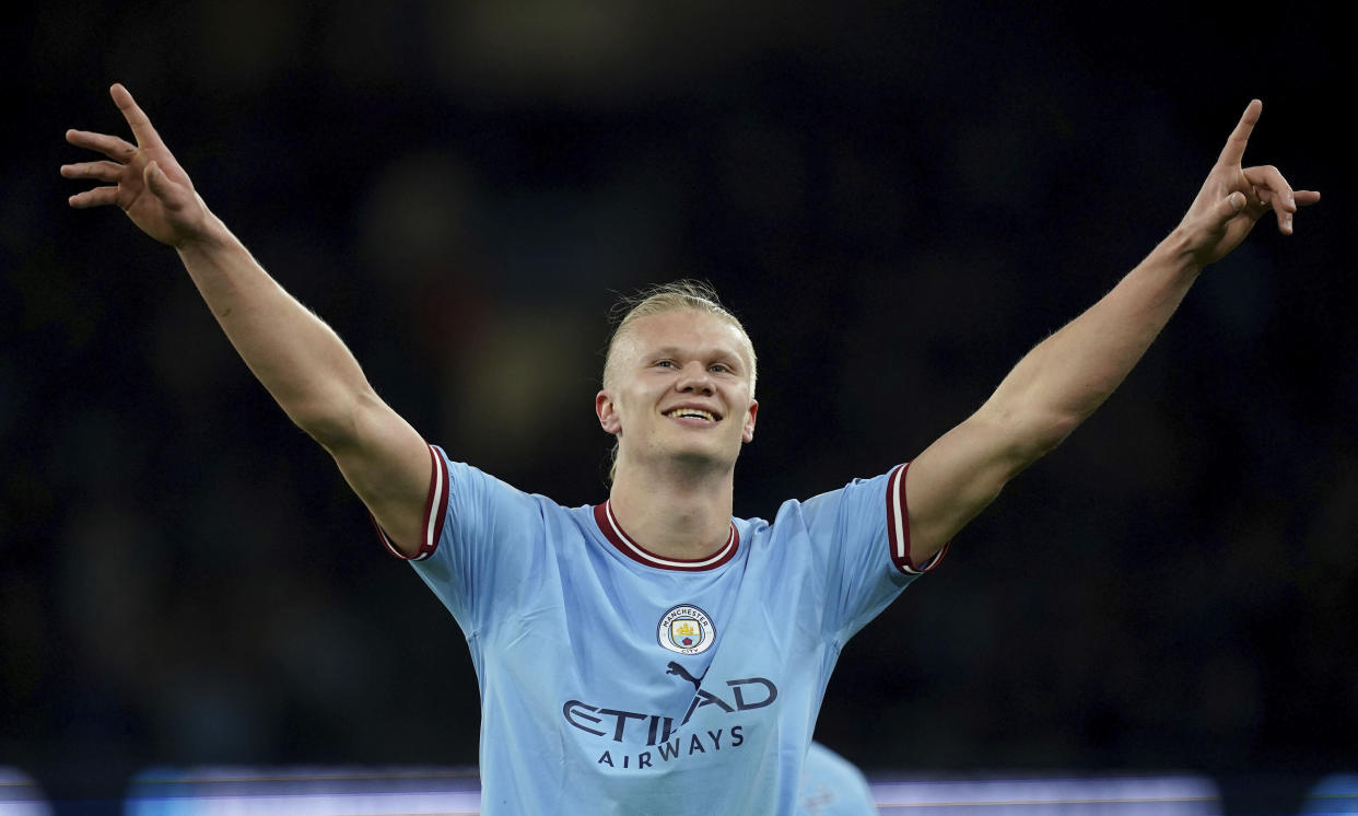 Manchester City&#39;s Erling Haaland celebrates his record-setting goal. (Martin Rickett/PA via AP)