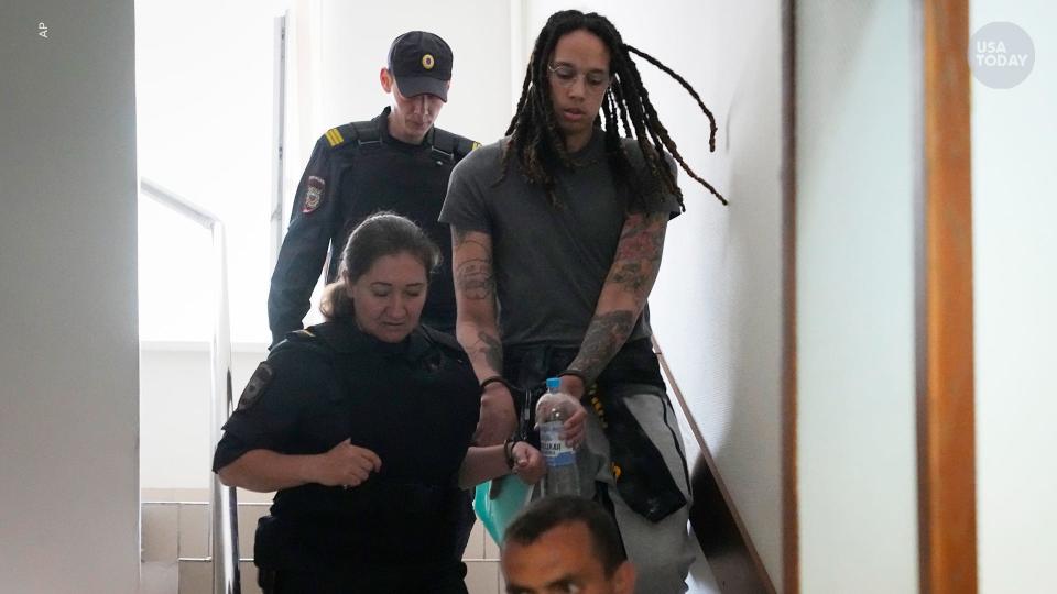 WNBA star and two-time Olympic gold medalist Brittney Griner is escorted to a courtroom for a hearing, in Khimki just outside Moscow, Russia, Monday, June 27, 2022. (AP Photo/Alexander Zemlianichenko)