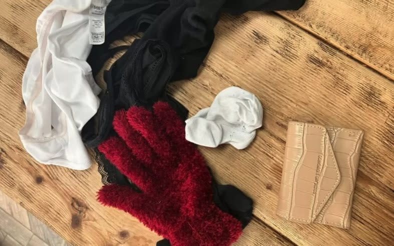 Random bits of clothing and a purse