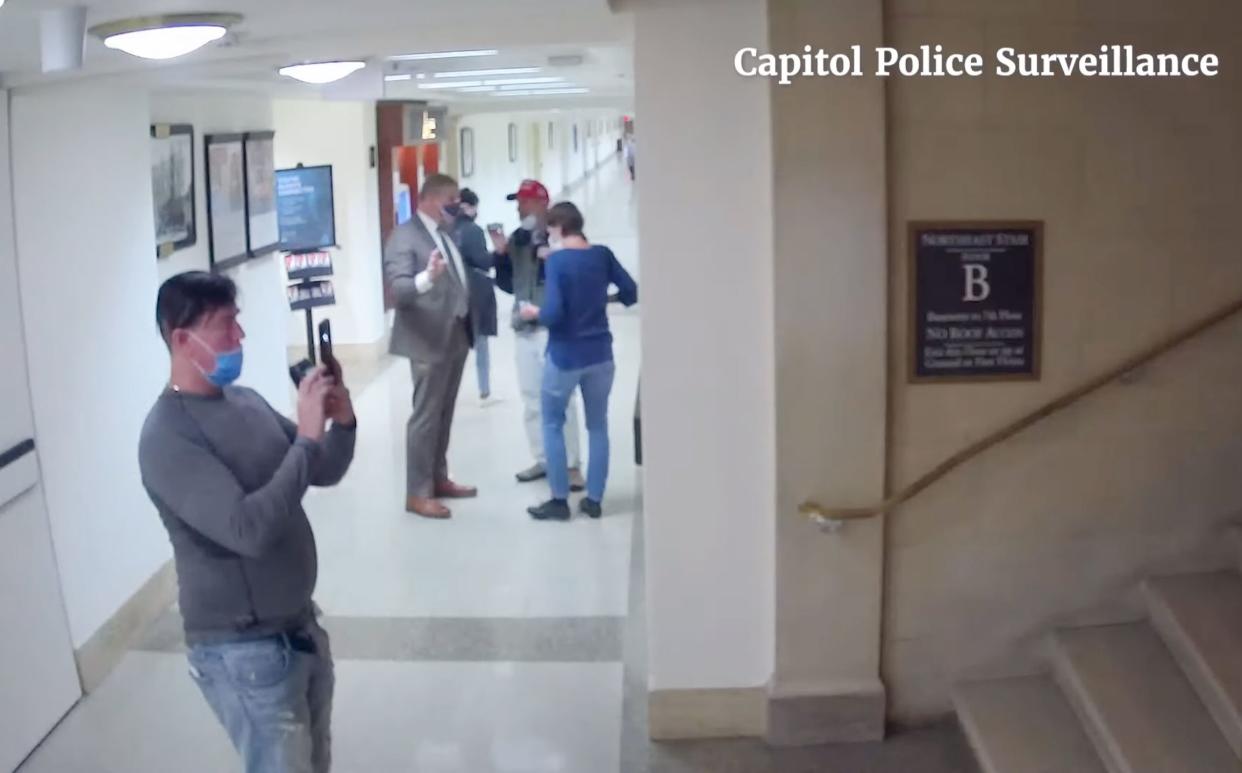 The tape depicts the group led by Rep. Barry Loudermilk (R-Ga.) taking pictures and videos of stairways, security posts and tunnels, all areas “not typically of interest to tourists,” according to the panel.