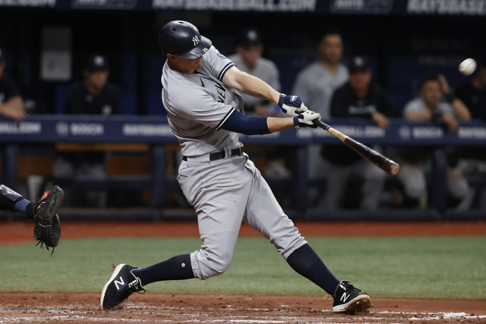 New York Yankees' DJ LeMahieu hits a home run against the Tampa Bay Rays during the fifth inning of a baseball game Friday, Aug. 25, 2023, in St. Petersburg, Fla. (AP Photo/Scott Audette)