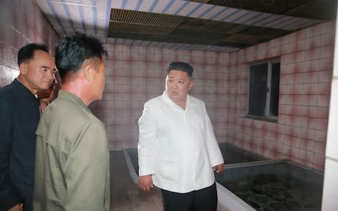 Kim criticised dirty hot spring bathtubs at the Onpho holiday camp, calling them "worse than fish tanks" - Credit: AFP