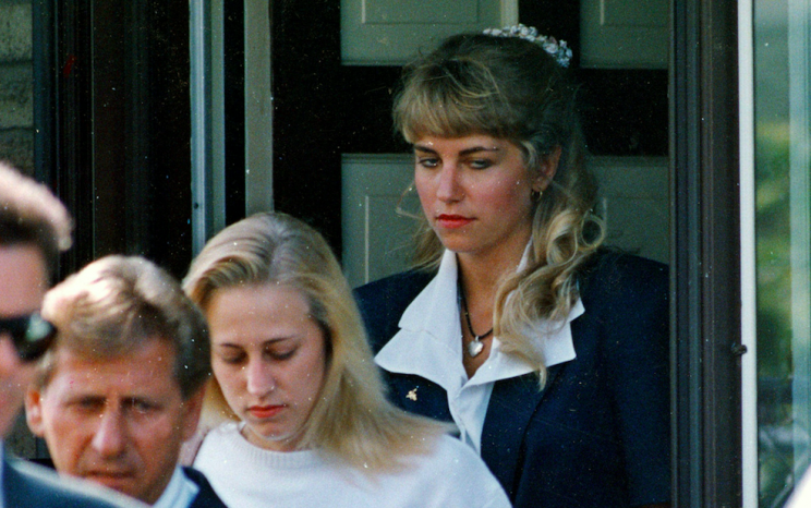 Karla Homolka (rear) was convicted over the rape and torture of three teenage girls (Rex)