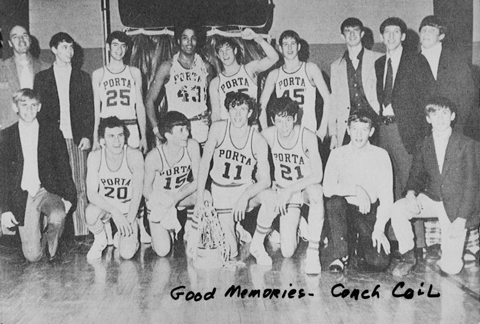 Kevin Washington (43) and his Petersburg PORTA teammates following a 77-72 supersectional win over Mendon Unity in 1973. The win propelled PORTA to the quarterfinals of the IHSA Class A boys state basketball tournament in Champaign.