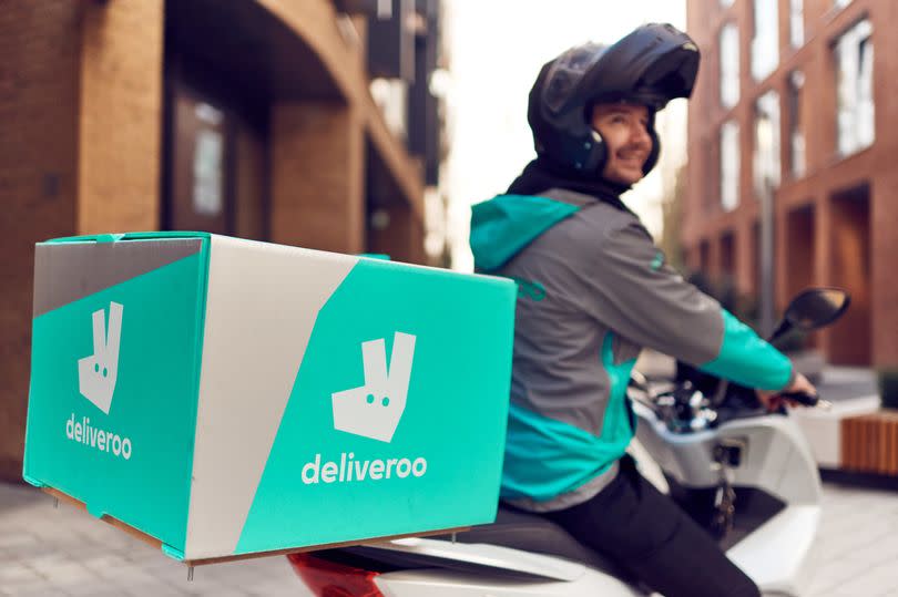 A Deliveroo cycle rider