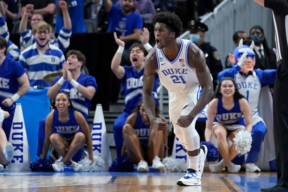 Duke forward AJ Griffin (21) celebrates after shooting a three point basket against Arkansas during the second half of a college basketball game in the Elite 8 round of the NCAA men's tournament in San Francisco, Saturday, March 26, 2022. (AP Photo/Marcio Jose Sanchez)