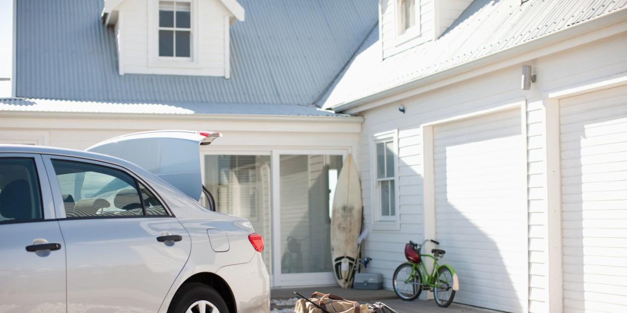 car in front of a house