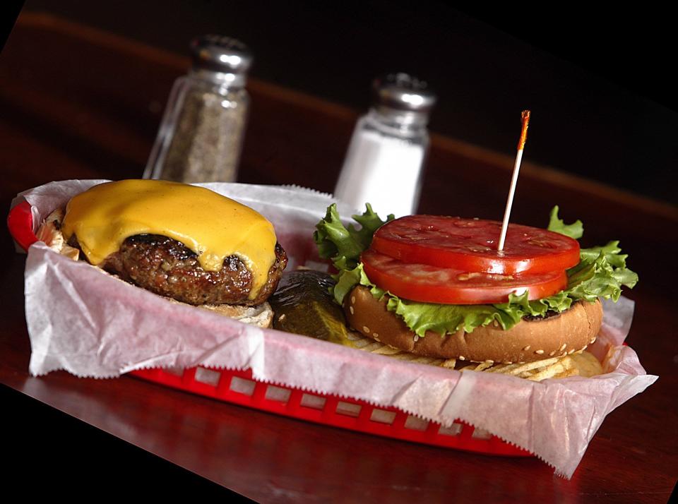 Smoky patty: The cheeseburger at the Brass Ring Pub in North Palm Beach.