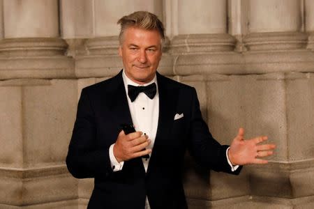 Actor Alec Baldwin gestures before walking on the red carpet during the commemoration of the Elton John AIDS Foundation 25th year fall gala at the Cathedral of St. John the Divine in New York City, in New York, U.S. November 7, 2017. REUTERS/Shannon Stapleton