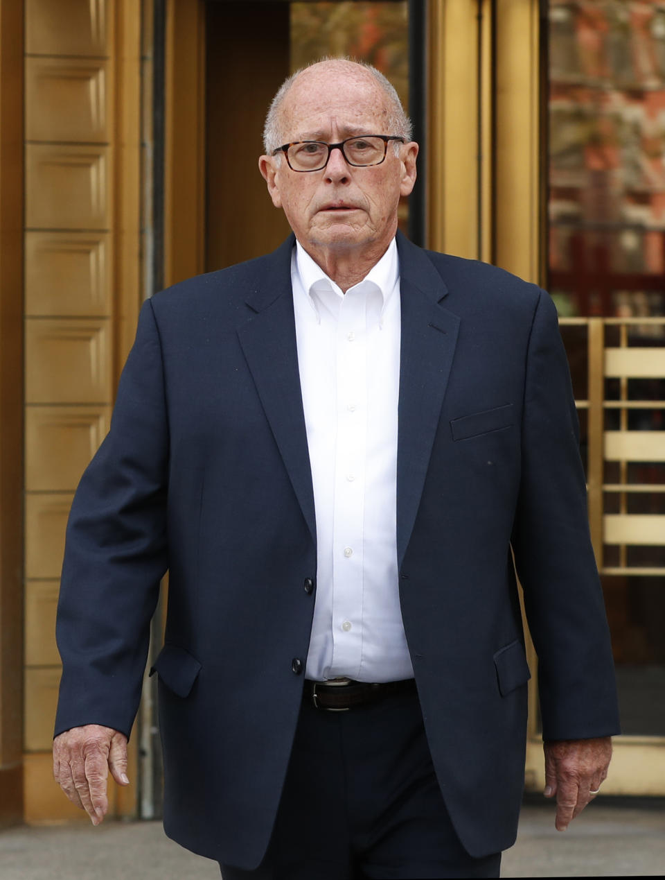 Former Rochester Drug Co-Operative CEO Laurence Doud III leaves US. District Court in Manhattan, Tuesday, April 23, 2019, in New York. Prosecutors allege Doud ignored red flags to turn his drug distributor into a supplier of last resort as the opioid crisis raged. (AP Photo/Kathy Willens)