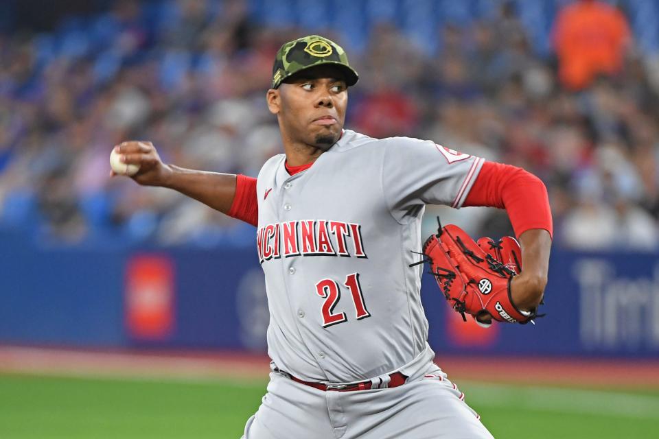 Cincinnati Reds starting pitcher Hunter Greene (21) pitches in the first inning against the Toronto Blue Jays at Rogers Centre on May 21 in Toronto.