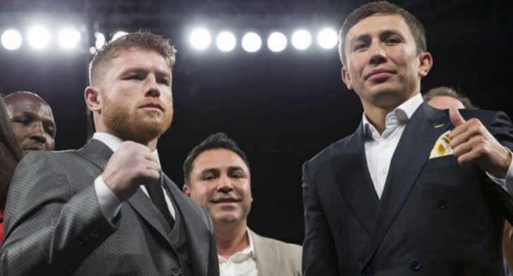 Canelo Alvarez (L) and Gennady Golovkin probably would've already fought by now if not for Oscar De La Hoya. (Getty)