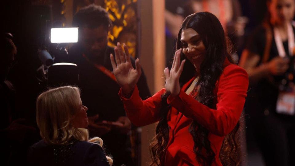 <div>NEW YORK, NEW YORK - APRIL 15: Kamilla Cardoso celebrates after being selected third overall pick by the Chicago Sky during the 2024 WNBA Draft at Brooklyn Academy of Music on April 15, 2024 in New York City. (Photo by Sarah Stier/Getty Images)</div>