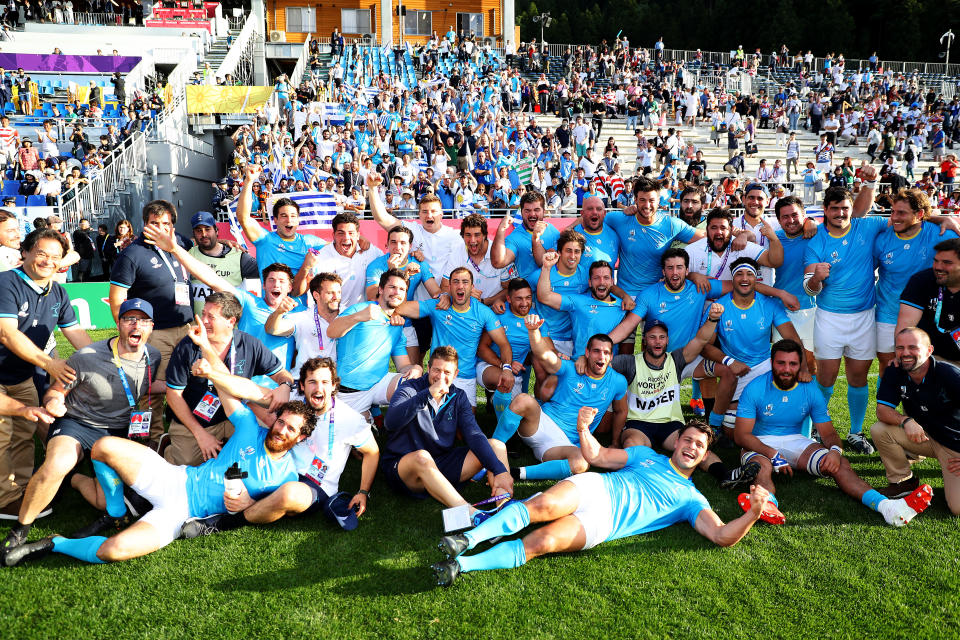 KAMAISHI, JAPAN - SEPTEMBER 25: Uruguay players and staffs celebrate after the Rugby World Cup 2019 Group D game between Fiji and Uruguay at Kamaishi Recovery Memorial Stadium on September 25, 2019 in Kamaishi, Iwate, Japan. (Photo by Warren Little - World Rugby/World Rugby via Getty Images)