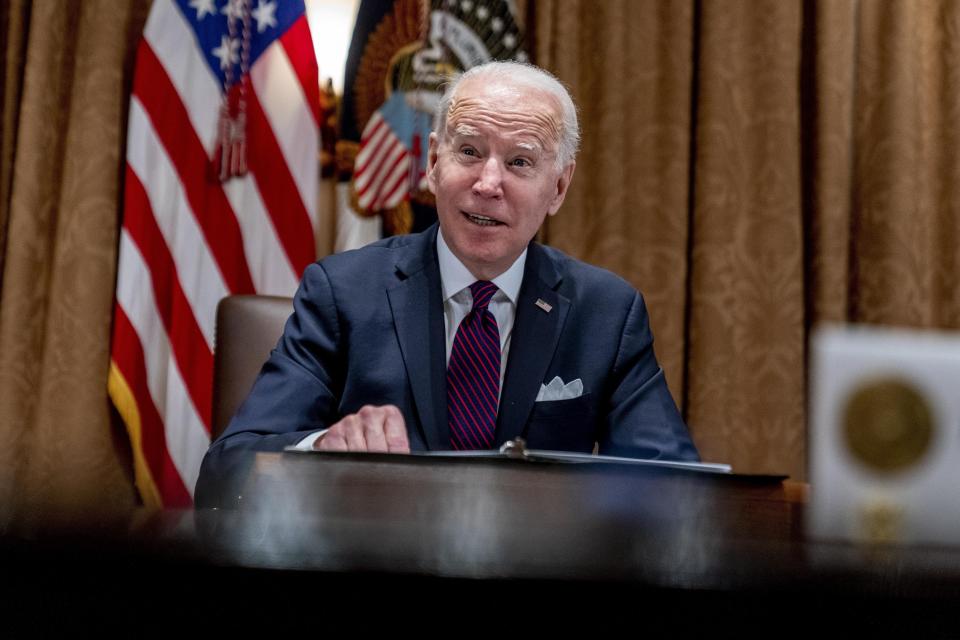 President Joe Biden, shown here meeting with members of the Infrastructure Implementation Task Force, Thursday, Jan. 20. [AP PHOTO/ANDREW HARNIK]