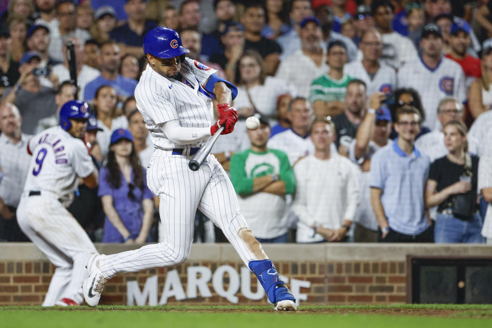 Aug 16, 2023; Chicago, Illinois, USA; Chicago Cubs second baseman Christopher Morel (5) hits a three-run walk-off home run against the Chicago White Sox during the ninth inning at Wrigley Field. Mandatory Credit: Kamil Krzaczynski-USA TODAY Sports