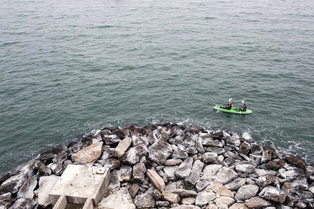 <p>Courtesy of Mariah Tyler</p> On a kayak around the haunted lighthouse on the Long Island Sound in October of 2016.