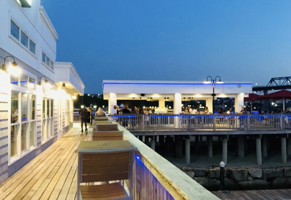 The outdoor deck at The Cove Restaurant and Marina in Fall River.