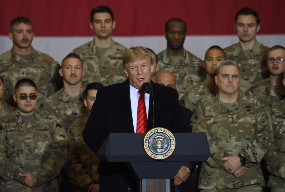 President Donald Trump speaks to the troops during a surprise Thanksgiving Day visit at Bagram Airfield on Nov. 28, 2019, in Afghanistan.