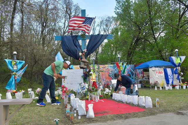 <p>Amy Davis/The Baltimore Sun/Tribune News Service via Getty</p> Wilfredo Garcia Arevalo (left) and Dallas, Texas artist Roberto Marquez at a vigil for the victims of the Key Bridge collapse