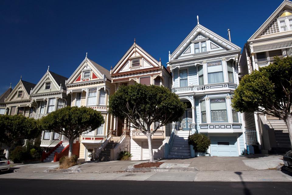 The Victorian houses known as the Painted Ladies in San Francisco.&nbsp;Assuming a household spends no more than 30 percent of its income on rent, it would need to make $180,000 a year to afford the median rent in the city. (Photo: Andia via Getty Images)