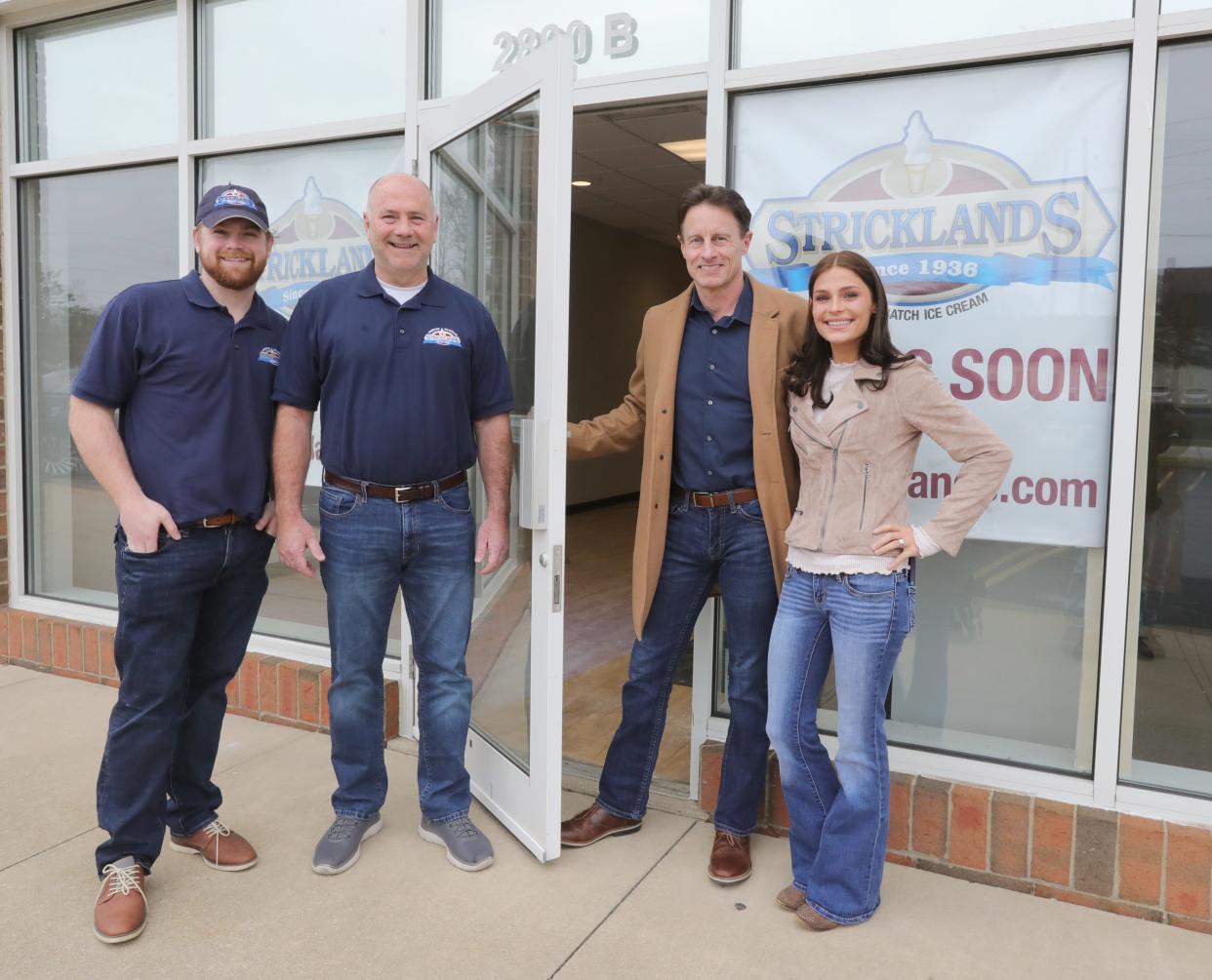 Jacob Margroff, left, and Stricklands President Scott Margroff stand with Shane and Lindsey Price outside the new Stricklands locations the Prices will open in Fairlawn in early summer.