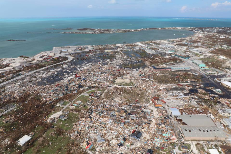 The destruction caused by Hurricane Dorian is seen from the air, in Marsh Harbor, Abaco Island, Bahamas, Wednesday, Sept. 4, 2019. The death toll from Hurricane Dorian has climbed to 30. Bahamian Health Minister Duane Sands released the figure Wednesday evening and warned that more fatalities were likely. (AP Photo/Gonzalo Gaudenzi)