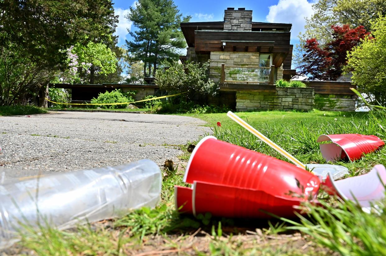 Party cups outside a house at 333 Howard St. in Northborough on Monday.