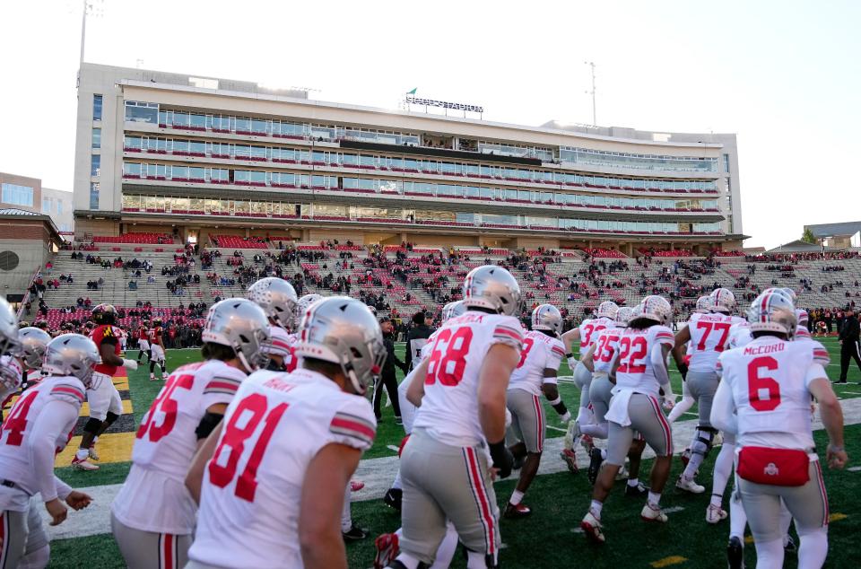 Nov 19, 2022; College Park, MD, USA; Ohio State Buckeyes take the field to get ready for their game against Maryland Terrapins at SECU Stadium. 