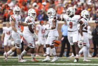 Bowling Green defensive lineman Blaine Spires (9) calls out to his team during the second half of an NCAA college football game against Minnesota, Saturday, Sept. 25, 2021, in Minneapolis. Bowling Green won 14-10. (AP Photo/Stacy Bengs)