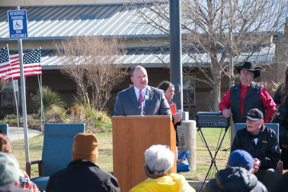 Rodney Gonzalez, executive director of the Amarillo VA Medical Center in Amarillo, addresses the crowd at the opening ceremony for the Vietnam Traveling Memorial Wall Wednesday at the Ussery-Roan Texas State Veterans Home in Amarillo.