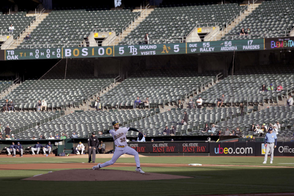 Oakland Athletics starting pitcher James Kaprielian (32) throws during the first inning of a baseball game against the Tampa Bay Rays in Oakland, Calif., Monday, June 12, 2023. (AP Photo/Jed Jacobsohn)