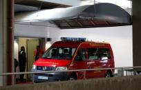 An emergency vehicle stands at an entrance at Duesseldorf airport March 24, 2015. REUTERS/Ina Fassbender