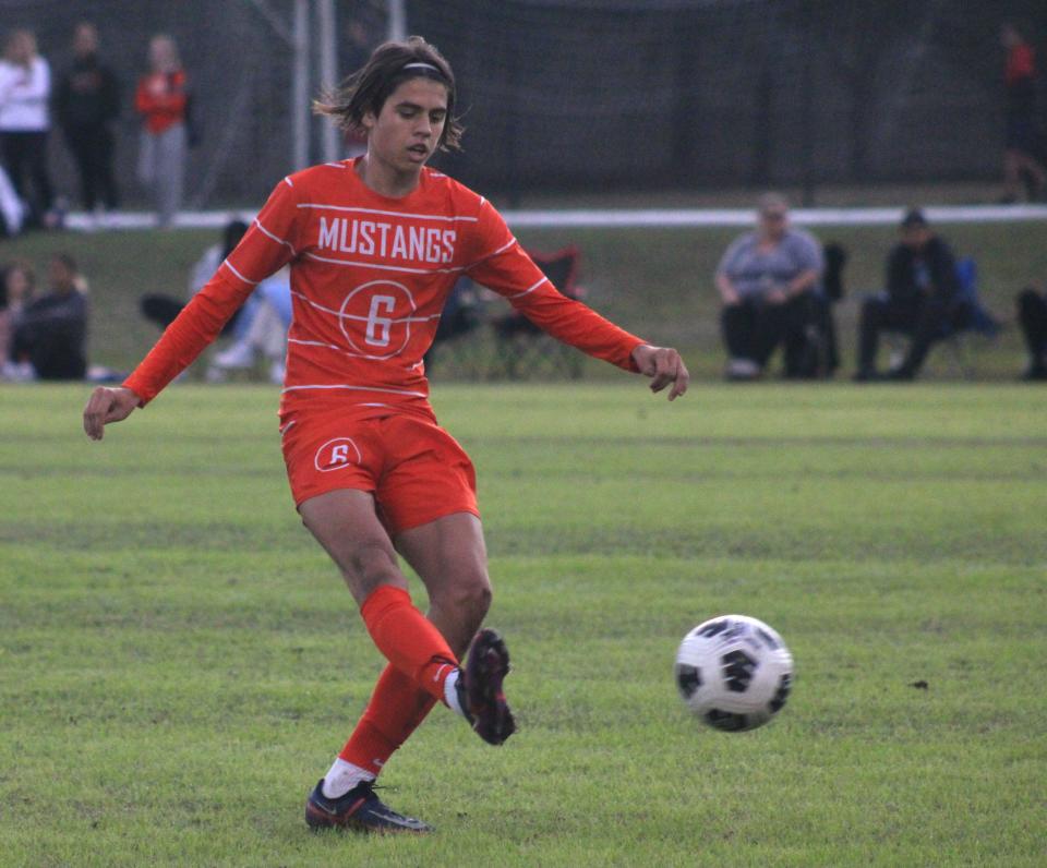 Mandarin midfielder Omar Trto (6) passes the ball upfield during the Gateway Conference high school boys soccer championship  against Stanton on January 14, 2022. [Clayton Freeman/Florida Times-Union]