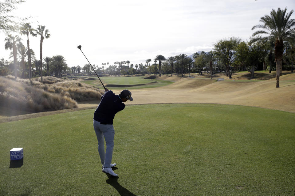 Rickie Fowler hits from the 10th tee during the second round of the American Express golf tournament on the Nicklaus Tournament Course at PGA West on Friday, Jan. 17, 2020, in La Quinta, Calif. (AP Photo/Marcio Jose Sanchez)