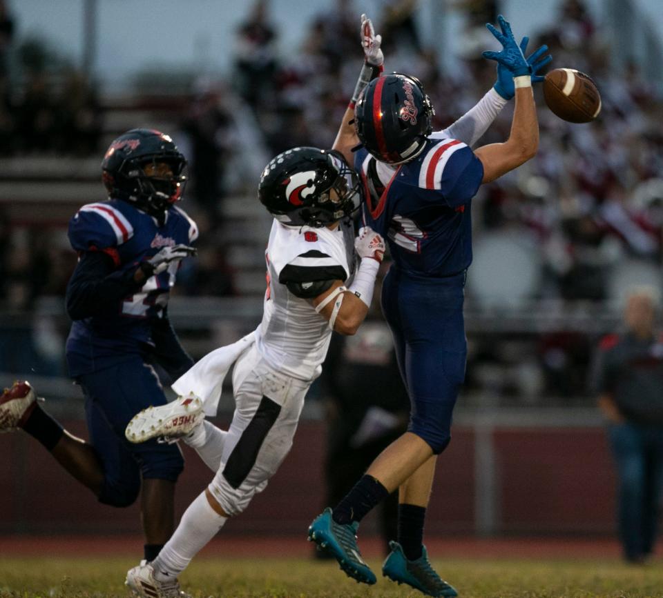 Jackson Memorial’s Albert D’Alessandro breaks up a pass intended for Jackson Liberty’s #2.  Jackson Memorial vs Jackson Liberty football. Jackson, NJFriday, September 30, 2022