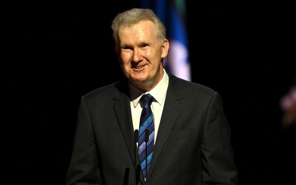 Tony Burke delivers a letter from King Charles at the service