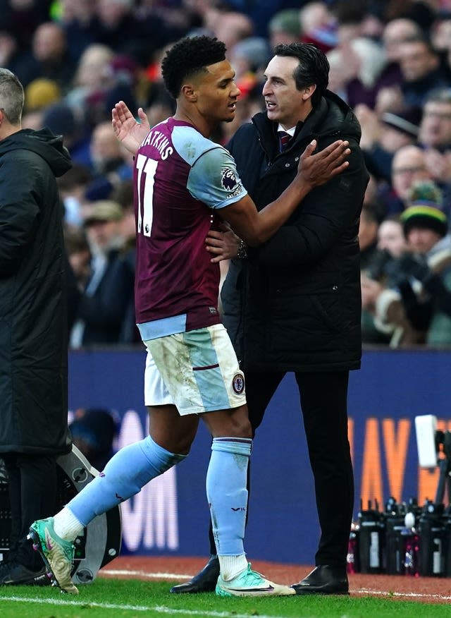 Aston Villa manager Unai Emery, right, congratulates Ollie Watkins as he is substituted having scored against Nottingham Forest