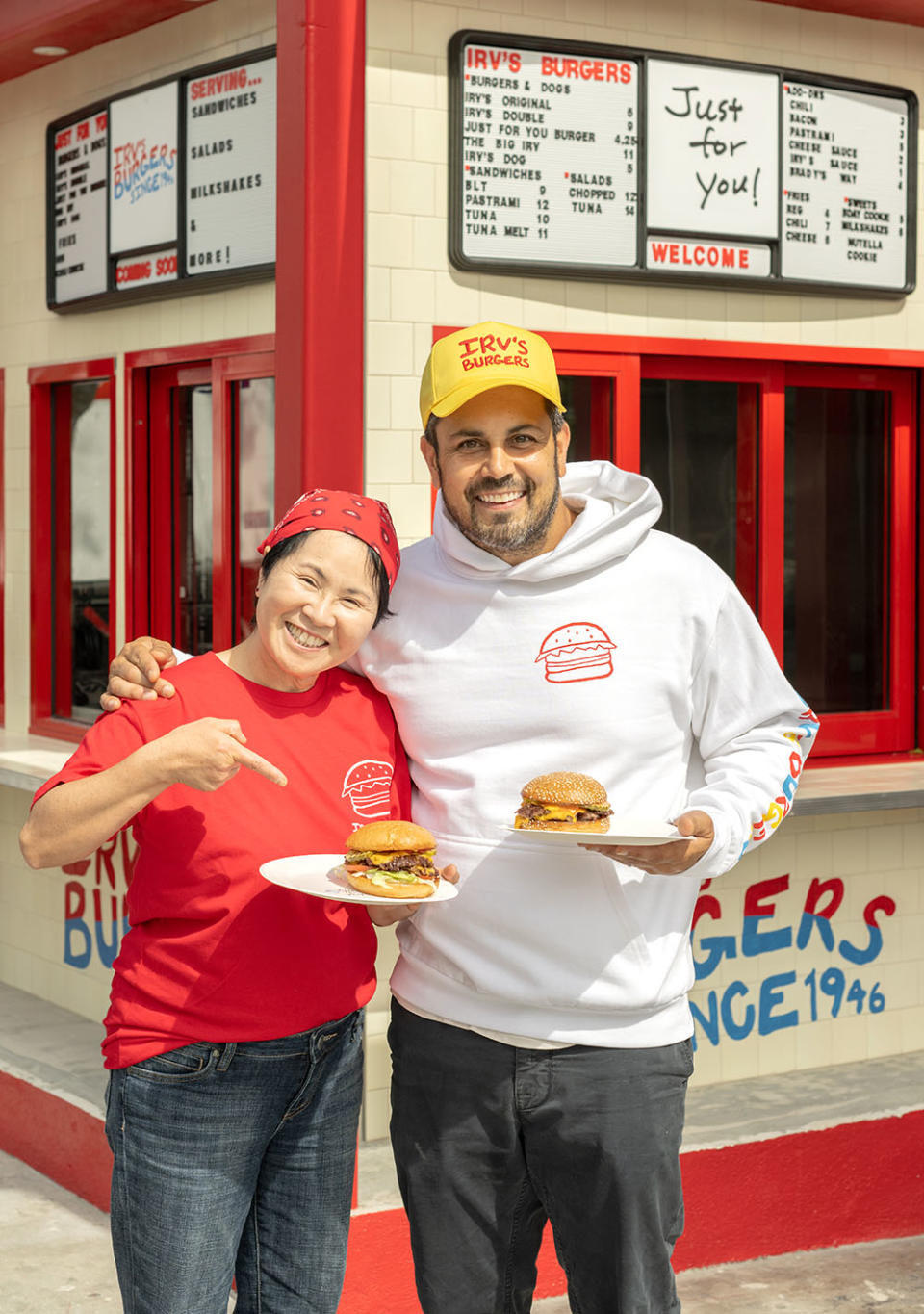 Sonia Hong and Lawrence Longo, business partners on the new venture, pose outside the shop during the tastemaker event in June 2022. - Credit: Courtesy of Irv's Burgers/Wonho Frank Lee