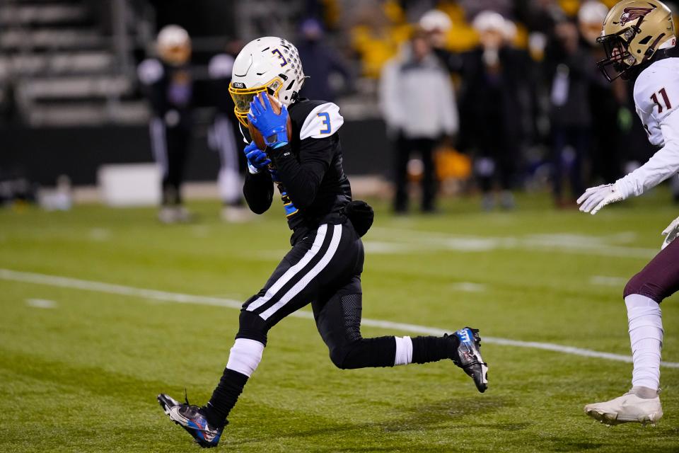 Gahanna's Isaiah Wills-Jackson intercepts a pass intended for New Albany's Elijah Griffith during the Lions' 25-17 win in the Division I, Region 3 final Nov. 18 at Historic Crew Stadium.