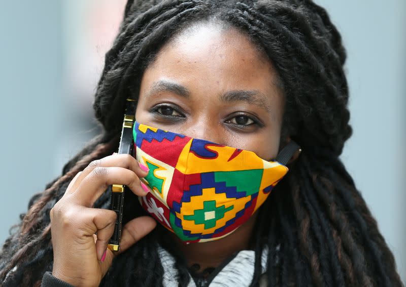 A pedestrian wears a face mask as the coronavirus disease (COVID-19) outbreak continues in Frankfurt