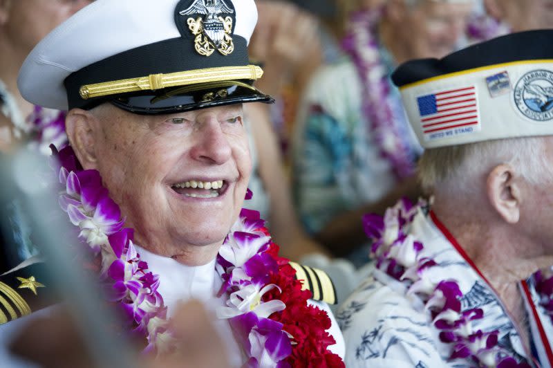 FILE – Lou Conter, an Arizona crewman, attends ceremonies for the 75th anniversary of the Japanese attack on Pearl Harbor, Dec. 7, 2016, in Honolulu. Conter, the last living survivor of the USS Arizona battleship that exploded and sank during the Japanese bombing of Pearl Harbor, died on Monday, April 1, 2024, following congestive heart failure, his daughter said. He was 102. (Craig T. Kojima/Honolulu Star-Advertiser via AP, Pool, File)